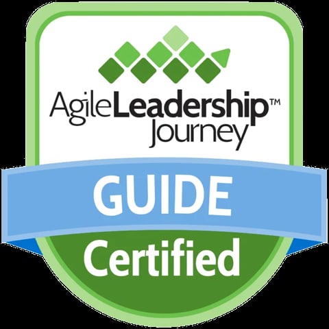 Agile Leadership Journey Certified Guide badge with green diamonds and blue ribbon banner