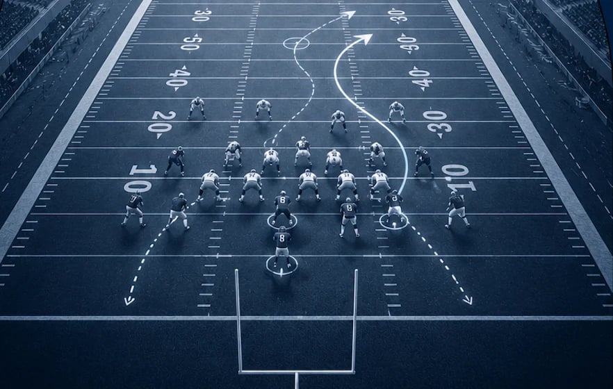 Football field diagram showing player positions and offensive play routes with dotted lines